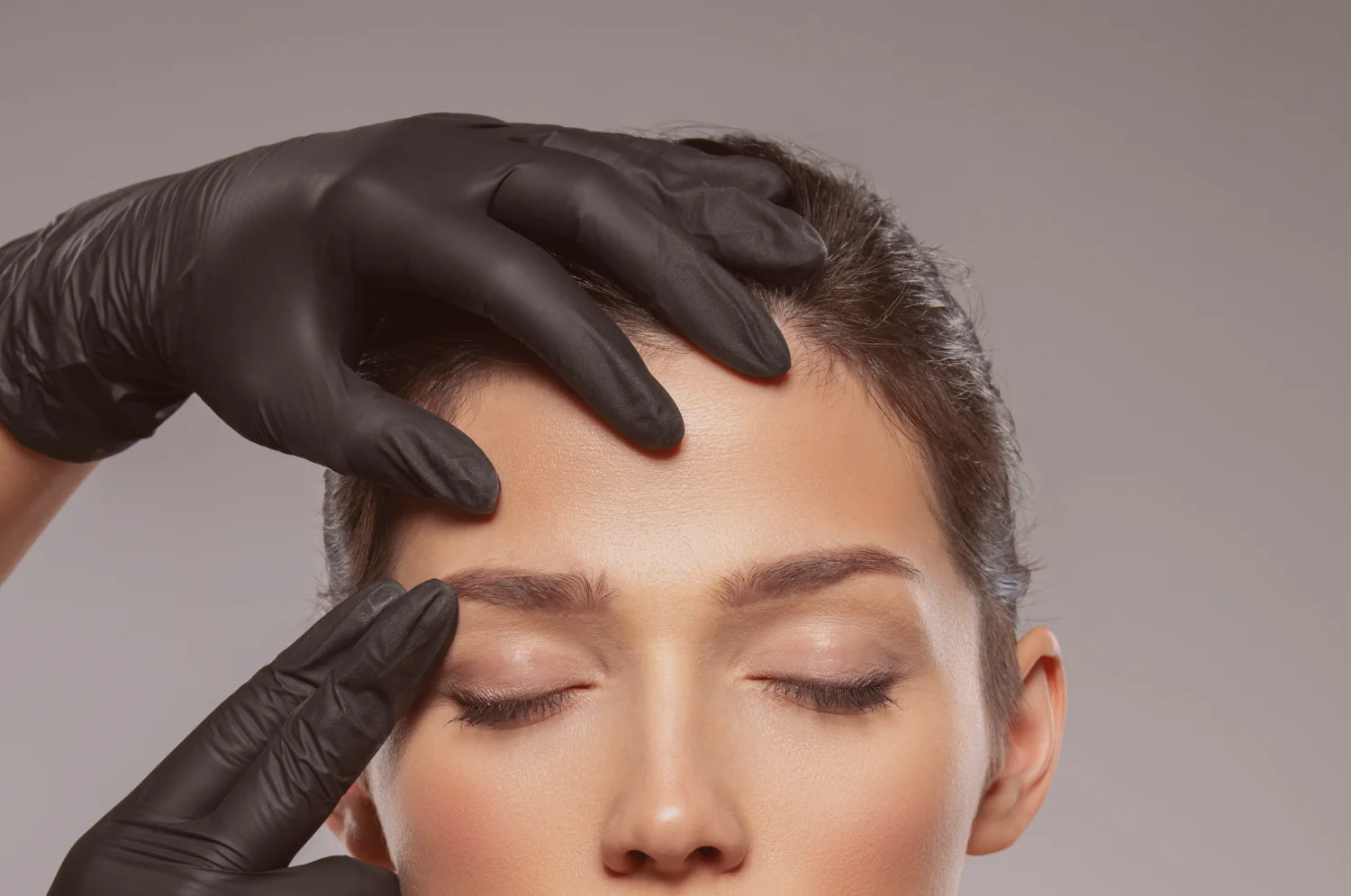 Dentist performing cosmetic Botox treatment for facial rejuvenation in Oklahoma City