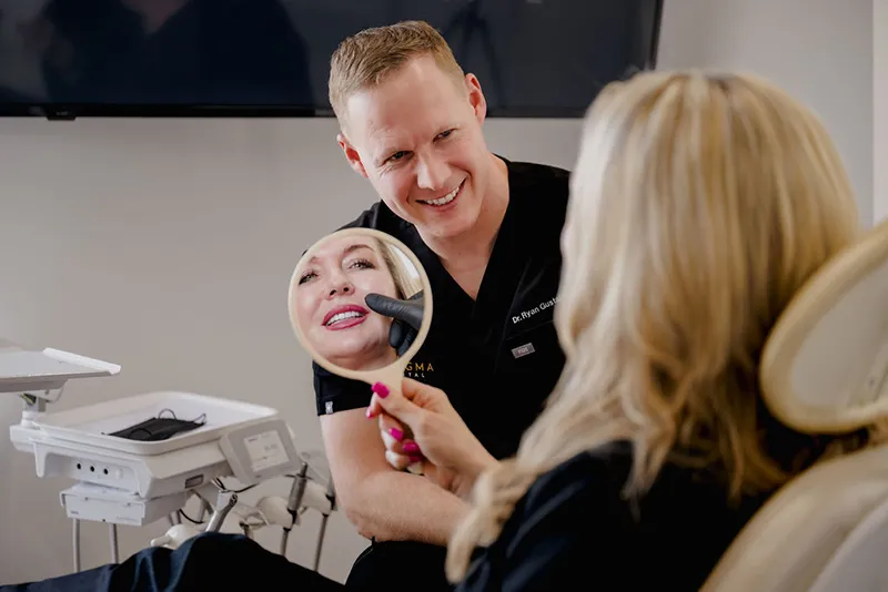 Patient Smiling After Dental Crowns Treatment At Pragma Dental