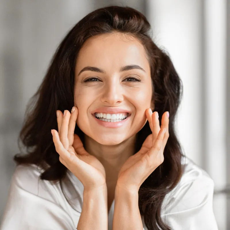 Woman With Porcelain Veneers Smiling